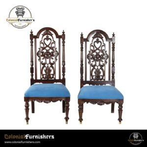 Victorian high-back teak chairs with carved detailing and colonial style